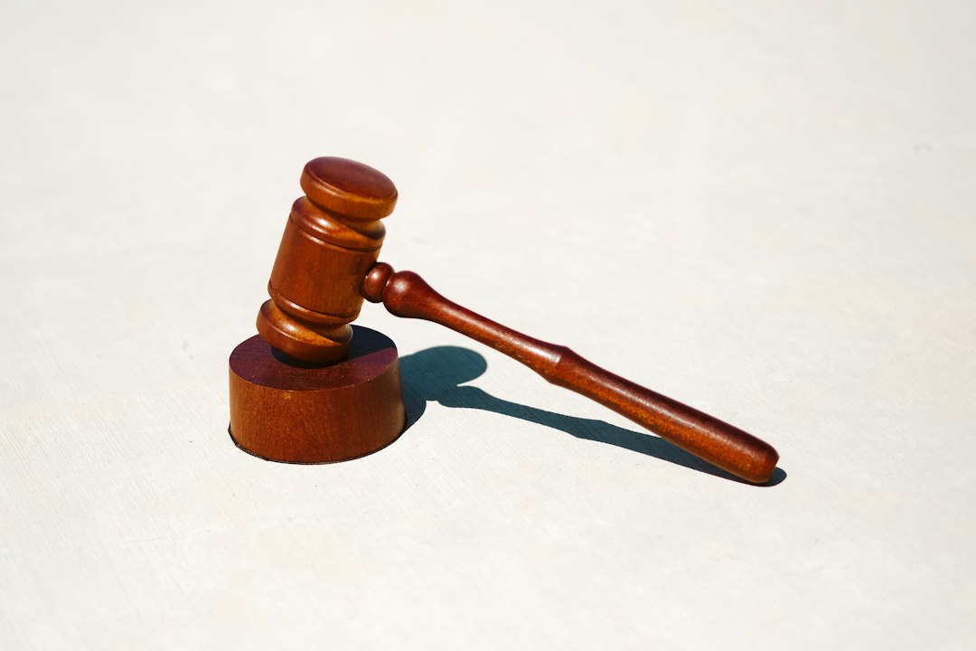 Wooden gavel on a flat surface